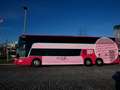 Megabus rosado en apoyo a la BCRF
